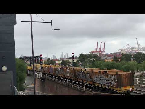 QL012 QL001 and QL010 passing over Bunbury Street rail bridge