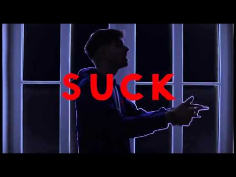 LEFT BOY   LAYING IN THE SNOW