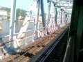 Так выглядит река Дон с железнодорожного моста, когда электропоезд въезжает в город Ростов ...
