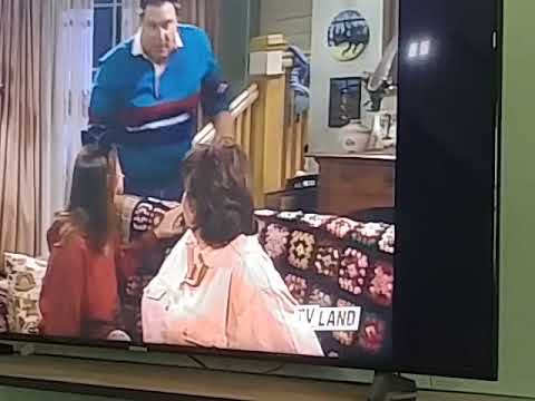 Roseanne with a gray cat 🐈