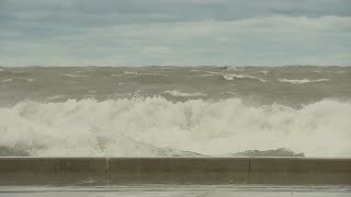 High waves up to 18 feet slam Lake Michigan shoreline