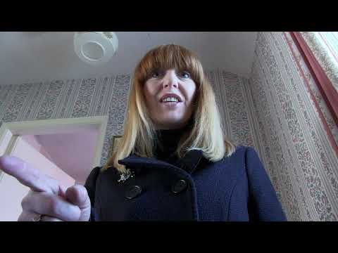 Investigator at the bedroom doorway—threshold cues thin to near-silence