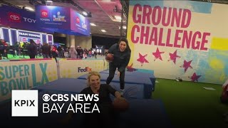 KPIX anchors Sara Donchey, Juliette Goodrich compete in the Super Bowl Experience