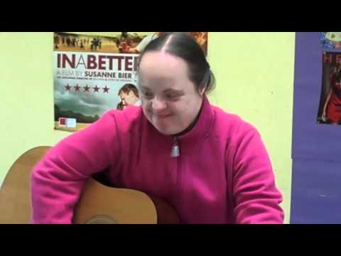 "Angela" playing guitar