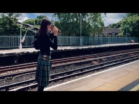 Suo Gan, Bagpipes. Welsh Lullaby. Bagpiper at Train Station, Millie the Piper.