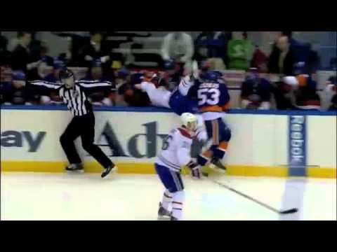 Alex Galchenyuk gets flipped into Islanders bench