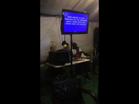 Malik, Barbados Calypso and social commentary legend singing karaoke