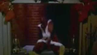 Kadr z teledysku Jingle Bells tekst piosenki Yello