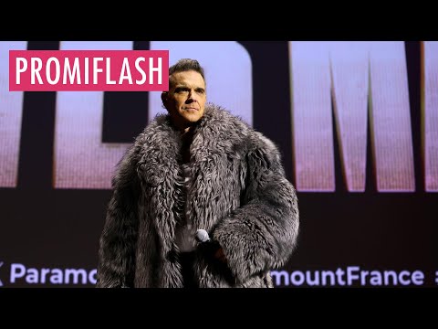 Robbie Williams traut ein Paar bei seiner Filmvorführung