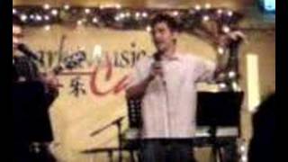 Adrian singing 'Hui You Na Me Yi Tian'