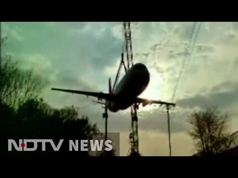 A Crane Carrying An Airplane Straight Up Collapsed In India
