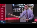 Brad Thompson demonstrates the art of laying down a sacrifice bunt