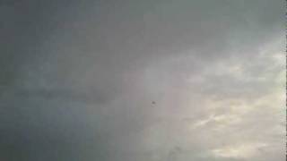 preview picture of video 'Plane & thunderstorm - July 10th 2010'