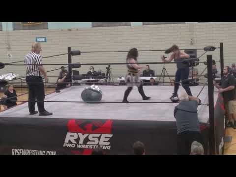 Honey Badger slams Laura Loveless on to a metal garbage can!!