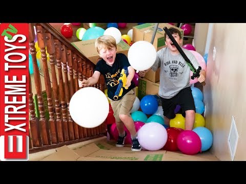 Moving Day Madness! Cardboard Box Balloon Slide Nerf Blast! Video