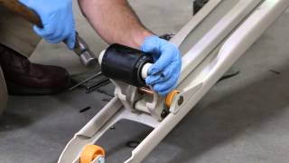 Replace the load wheels on a pallet jack