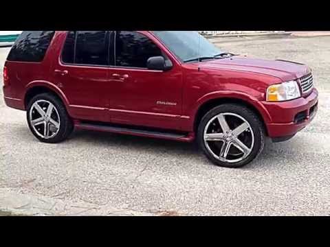 2002 Ford Explorer sitting on 22" Heavy Hitter HH15 Chrome Wheels on Tires