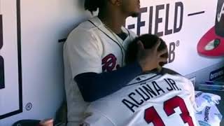 Mental Health - Value of Comfort -Atlanta Braves’ Ozzie Albies comforting teammate Ronald Acuna Jr.’