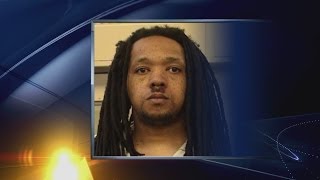 Officials search for wanted murder suspect