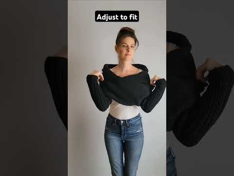 ✨ Cozy up with the ultimate hybrid — a **Sweater Scarf with Sleeves**! ✨