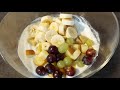 fruit salad with yoghurt,apple and grapes salad with yoghurt, apple grapes banana salad with yoghurt