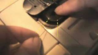 Inserting the bobbin on a Singer sewing machine