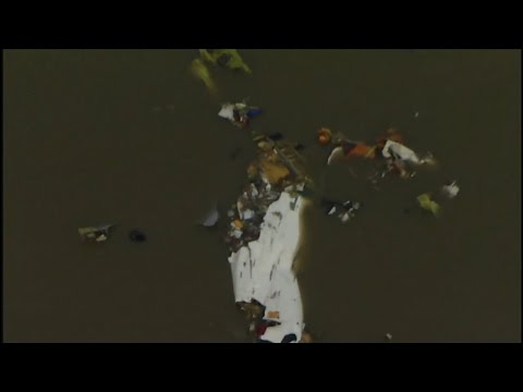 A southeast Texas sheriff said Sunday that two bodies have been recovered at the site where a Boeing 767 cargo plane crashed into a coastal bay. All three people aboard the Flight 3591 died, according to the plane's owner. (Feb. 25)