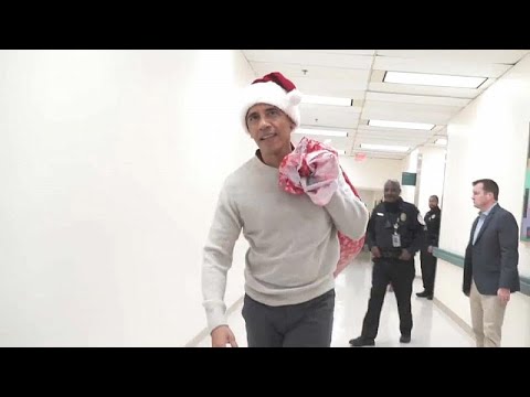 شاهد سانتا كلاوس اسمه "باراك أوباما" يزور أطفالا مرضى في واشنطن…