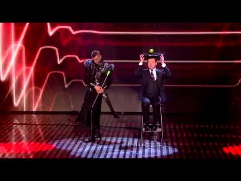 amazing Aaron Crow shoots an apple off Dec at Semi-Final