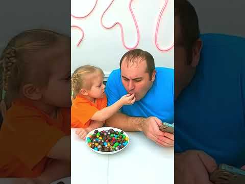 Dad bites baby’s gumball finger 😂