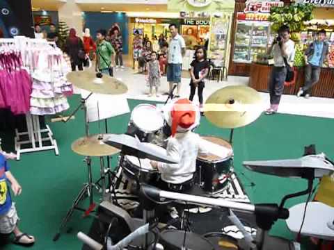 5 year old performing Trinity Guildhall Grade 1 Drum Kit: Sunny Side Up
