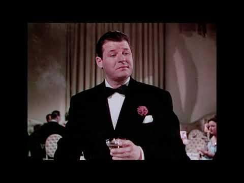 Trailer still showing radio studio microphones and big-band setup used in multiple numbers