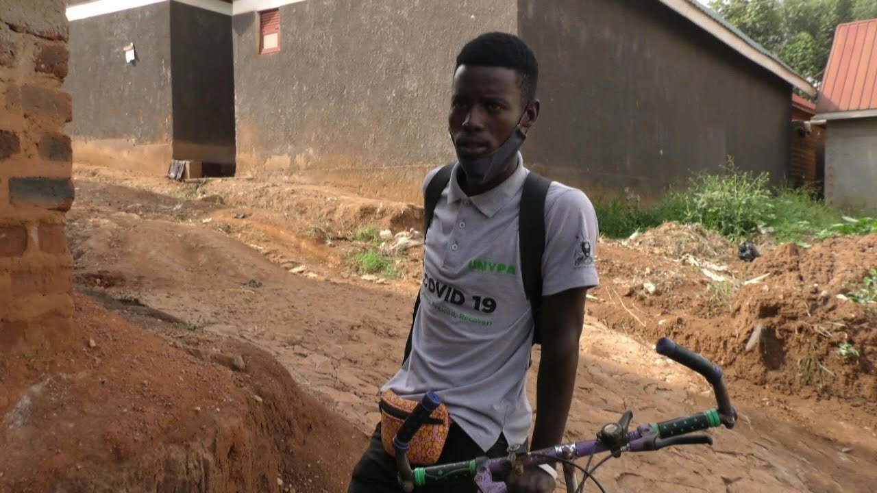 Ugandan activist delivers medication to HIV patients during coronavirus lockdown | AFP