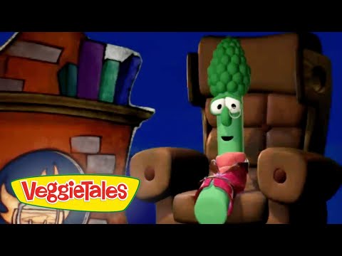 Animated green veggie with a broccoli-like head sits on a brown throne, wearing a pink scarf; VeggieTales logo visible in the corner.