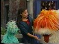 Sesame Street Celina Watches Barkley