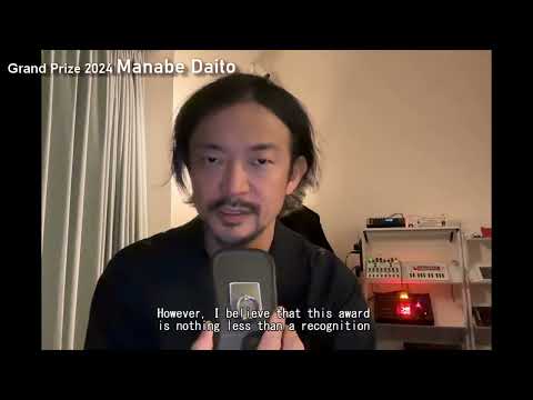 写真：Message from MANABE Daito