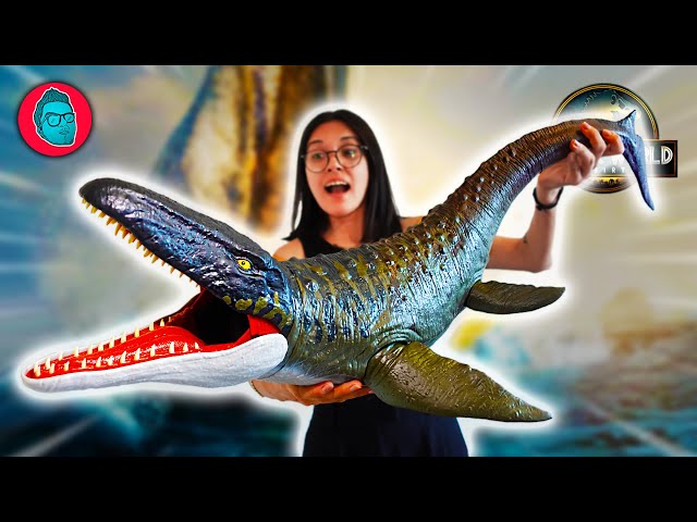 Vídeo relacionado con Mattel Jurassic World: El Renacer, Grandes embestidas Quilantaisaurio Figura de dinosaurio de juguete de especie grande, con 2 embestidas, juego digital, JGB95