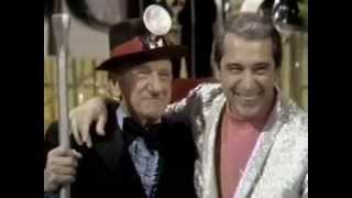 Jimmy Durante clowns with Perry Como