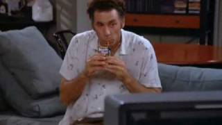 In the Season 5 episode "The Lip Reader," George gets caught at a tennis game on television eating with ice cream all over his face. Two of the sports commentators make some funny cracks when they see George, and of course David is one of the men joking about him.