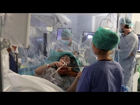 Woman plays violin while surgeons remove tumour from her brain