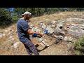 The Treasure Was Found Near The Directional Marker On The Rock
