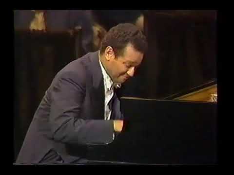 Andre Watts plays: Claude Debussy's "La Plus que Lente", "Danse", and  "L'Isle Joyeuse."