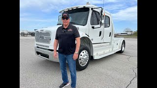 A preview image of the linked video showcasing 2023 Freightliner M2 106 Laredo