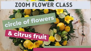 Circle of flowers & citrus fruit