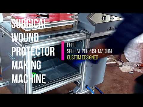 Automatic three phase surgical wound protector making machin...