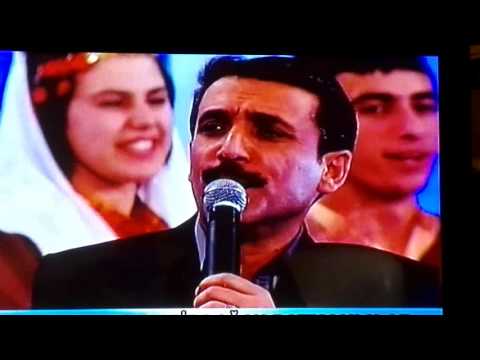 LATİF  DOĞAN EȘARBINI YANBAĞLAMA