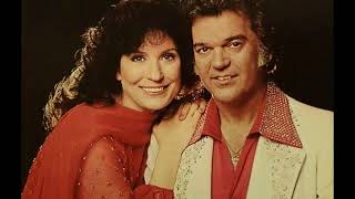 After The Fire Is Gone by Conway Twitty and Loretta Lynn from their album We Only Make Believe