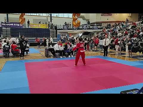 Taekwondo Tournament Lewis does two nunchucks 5.14.22