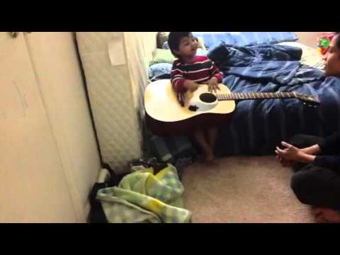 Shiven playing guitar