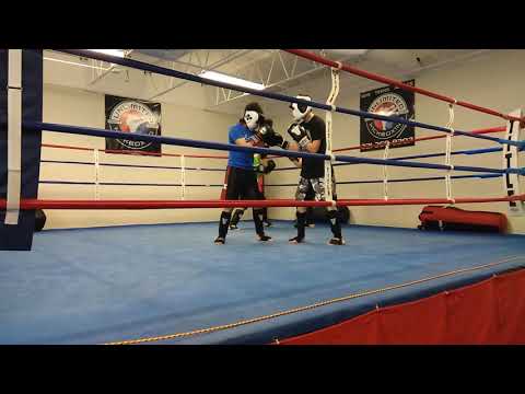 My 14 yr old with fellow fighter in kickboxing class